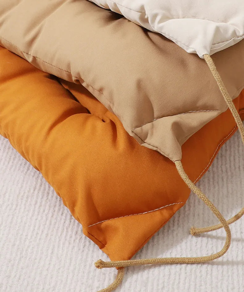 Tied cage cushion pet nest in beige, coffee or orange colours showing four size options for small dogs and cats