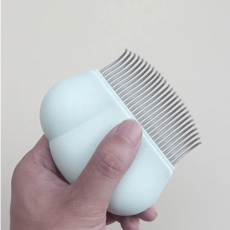 Paw Soft deshedding brush grooming tool for cats and dogs on white background
