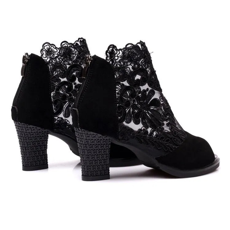 Black lace women's gladiator sandals with a square high heel and peep toe.