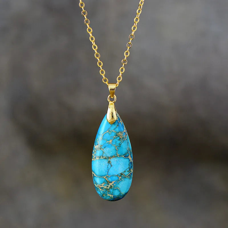 Genuine jade water drop pendant necklace with 18K gold plating in four colour options on a metal chain.