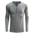 Blue men's long sleeve cotton blend T-shirt with a Henry neck on a hanger.