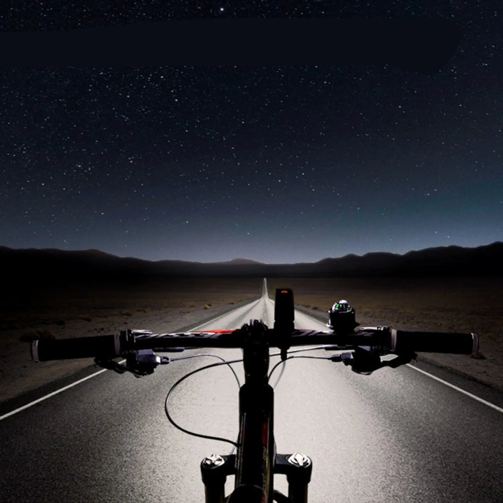 CREE XPG3 600 lumen aluminium bicycle headlight with black finish mounted on handlebars, IPX6 waterproof for night riding