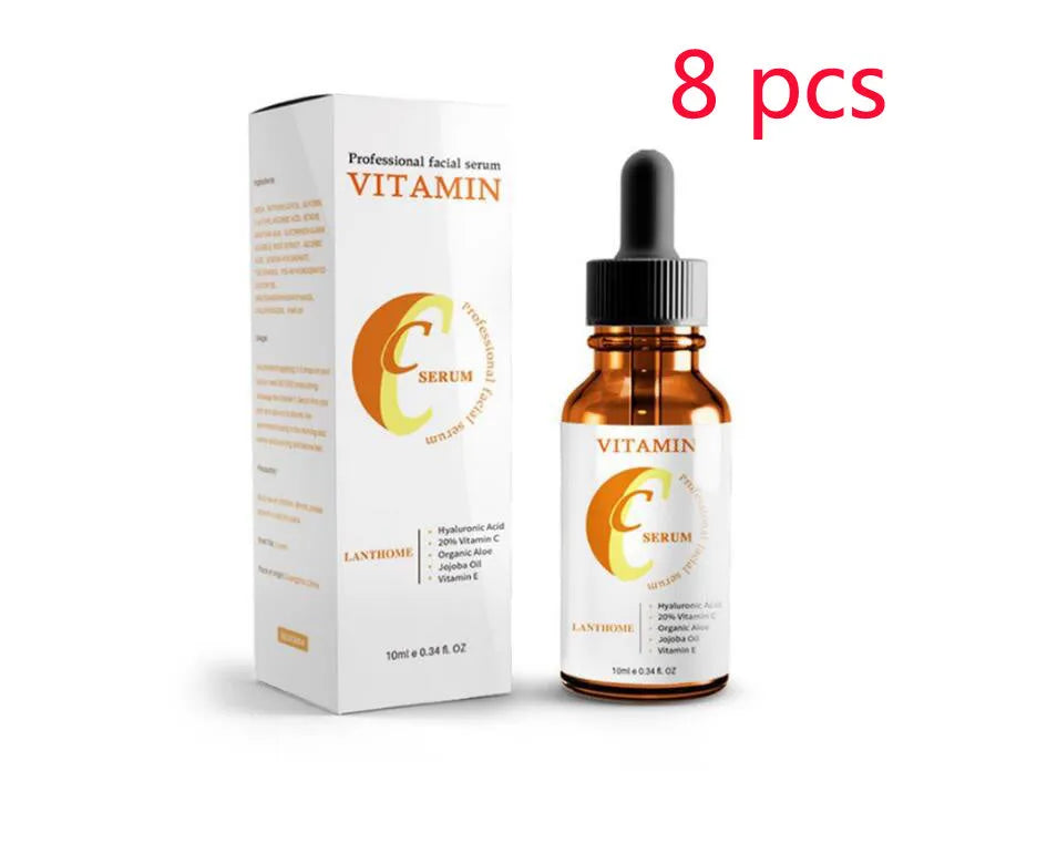 Bottle of Vitamin C and hyaluronic acid facial serum for skin brightening and anti-aging.