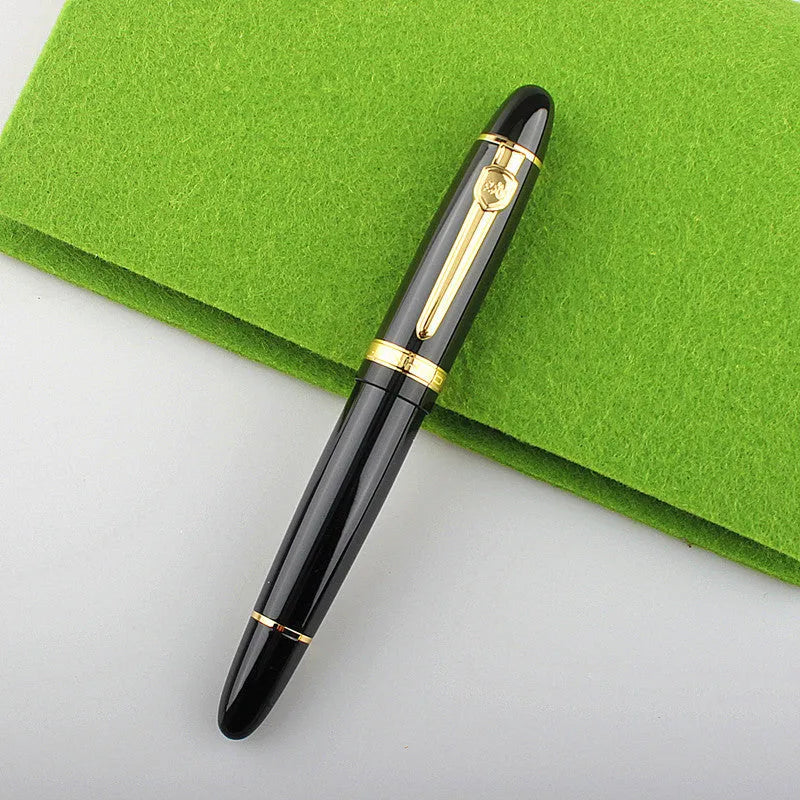 Metal ball pen with pearl round beads and black gold clip on white background