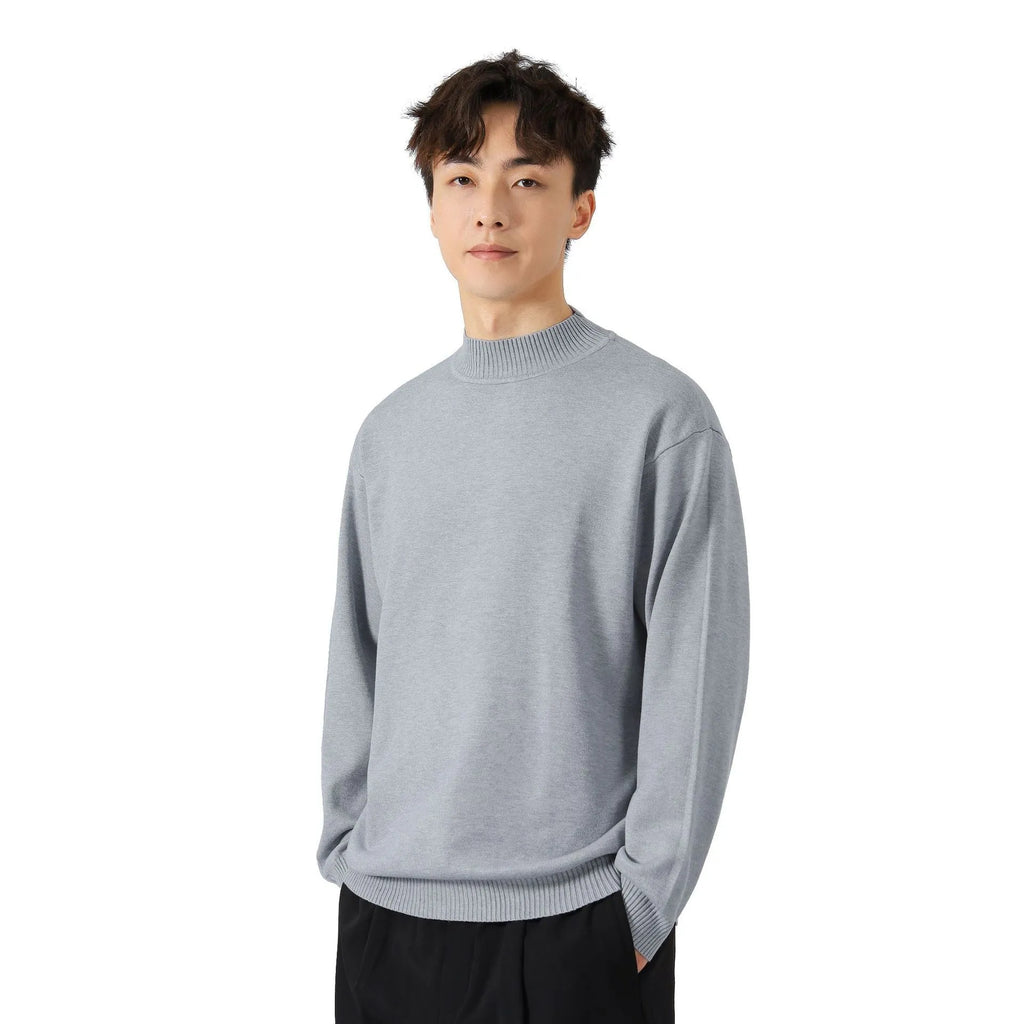 Man wearing a loose-fit army green long-sleeved pullover sweater for casual wear.
