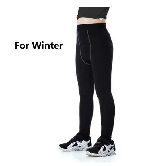 Children's black and green polyester-spandex sportswear set with T-shirt and trousers.