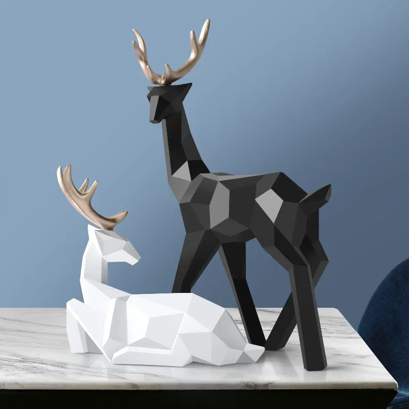 Modern resin deer statue decoration in a choice of colours including black, blue, gold, green, white, and white and black.