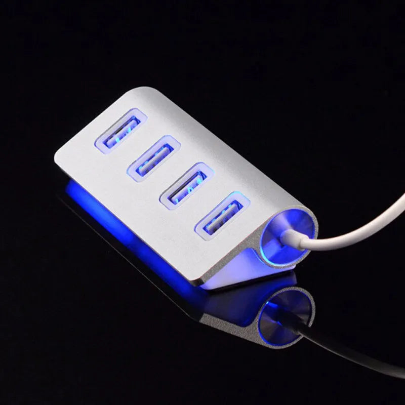 Silver USB-C to 4-Port USB 2.0 hub with aluminium alloy body on white background