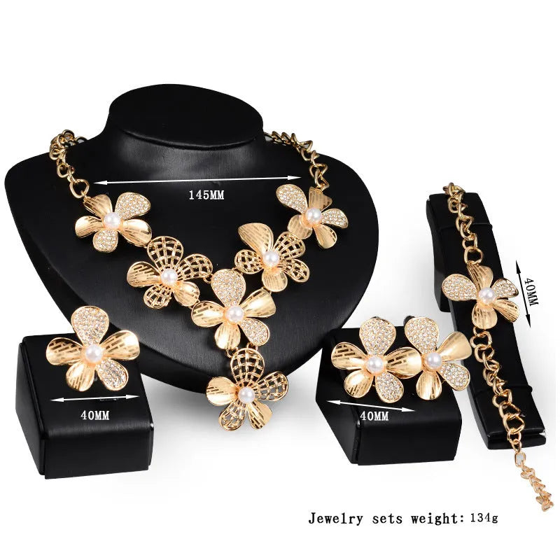 Gold alloy four-piece jewellery set with earrings, necklace, and bracelet in 18K colour, plant flower pattern