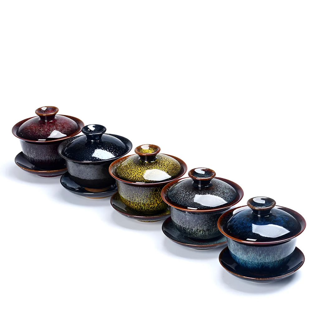 Three-piece ceramic tea set with covered bowl and teacup in black transmutation glaze finish