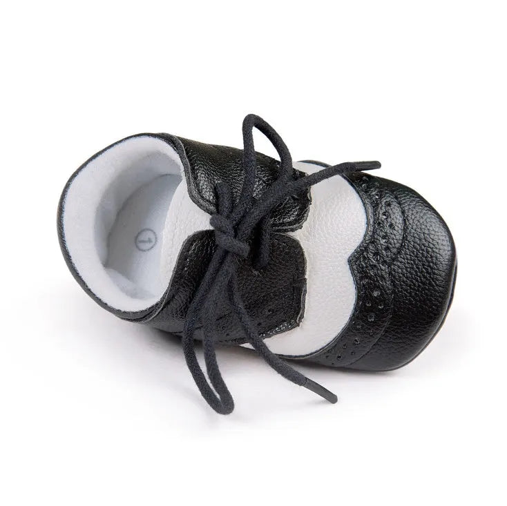 Vintage style soft-soled baby walking shoes in black, grey, light brown and white for infants 0-12 months