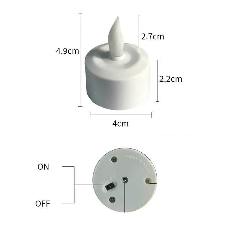 White plastic rechargeable LED candle lamp with yellow glowing flame on a table.
