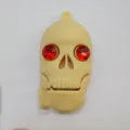 Halloween skeleton skull shaped USB flash drive with cartoon features and attached keychain