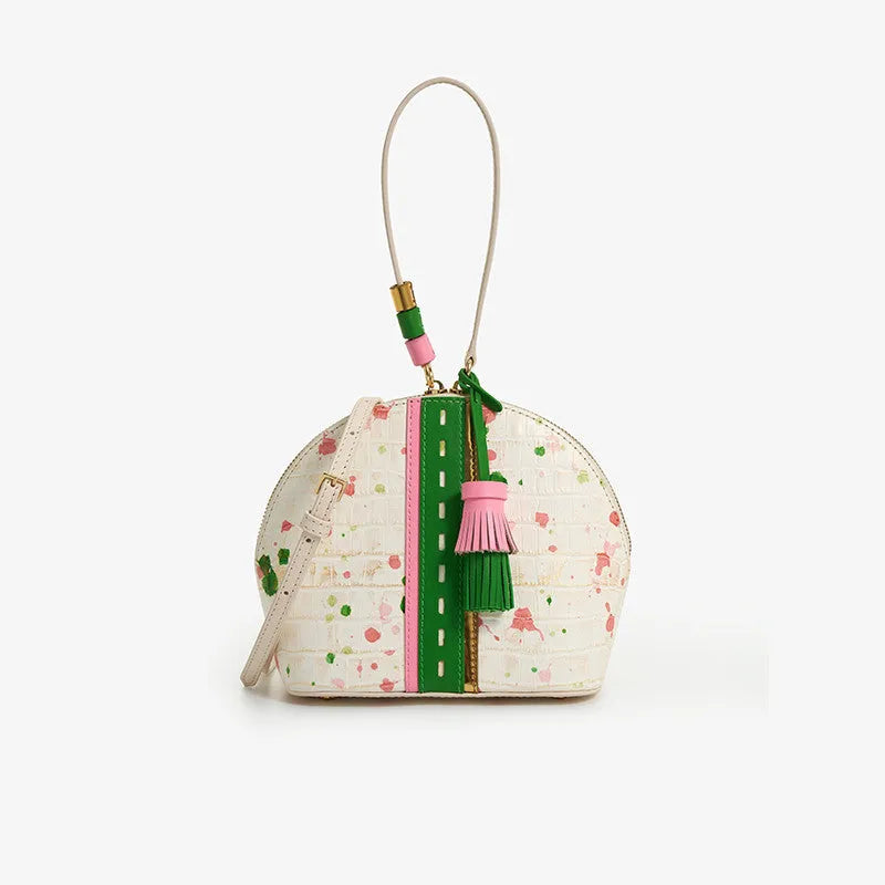 Women's genuine cow leather shell shape tassel handbag in Gypsophila colour with zipper closure