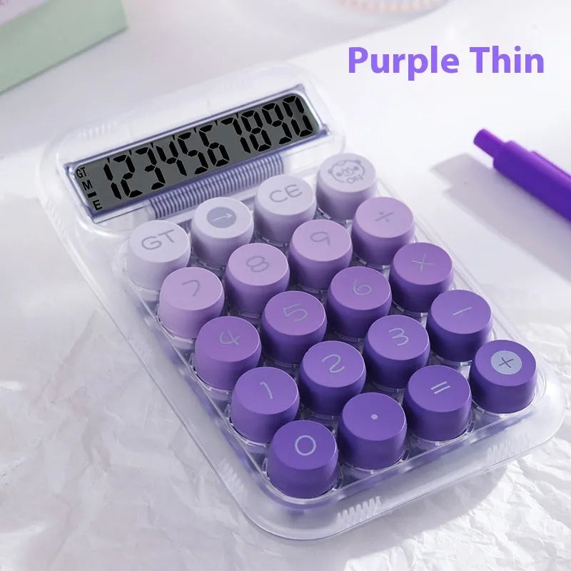 Round mechanical calculator with gradient colour keys in mute blue, green, pink, or purple