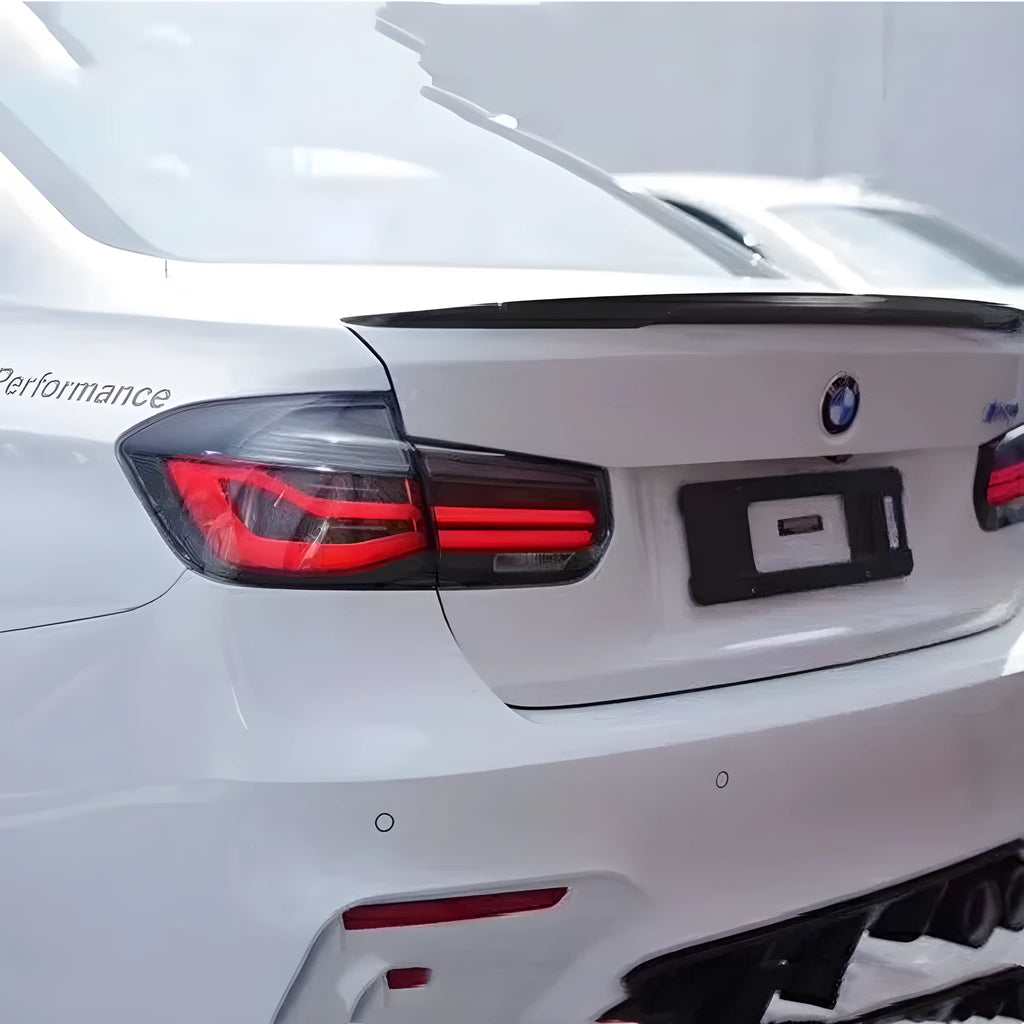 BMW 3 Series modified tail light assembly with streamer LED indicators in red or smoked black finish