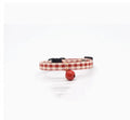 Red plaid cat collar with silver bell on adjustable strap