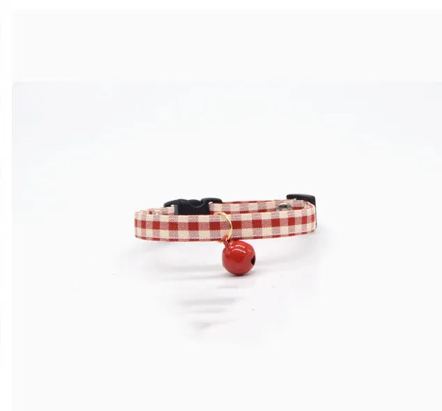 Red plaid cat collar with silver bell on adjustable strap