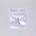 Manicure magnet tool with metal Y-shaped bracket and cylindrical magnet for cat eye nail polish effects
