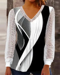 Women's loose purple V-neck lace top with long sleeves on a hanger.