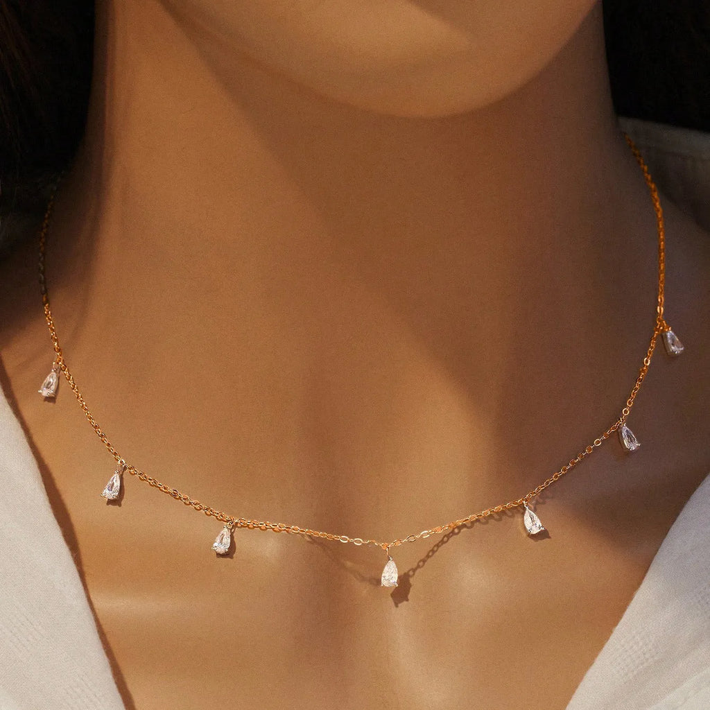Gentle drop-shaped artificial zircon pendant on an adjustable 925 sterling silver O-chain necklace.