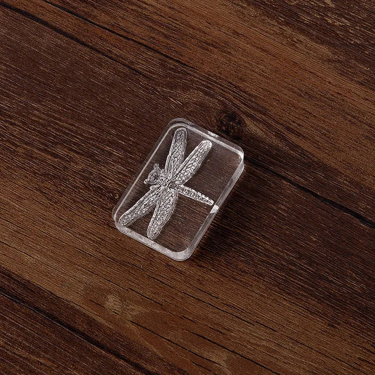 Transparent acrylic hand account seal with 12mm height showing dragonfly colour option