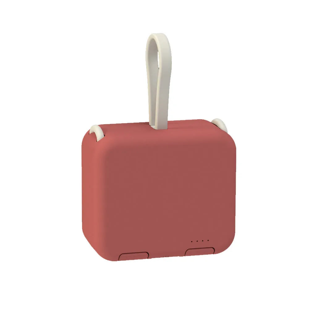 Handbag clip-on power bank in blue showing USB-A, Type-C and Lightning ports and built-in phone stand