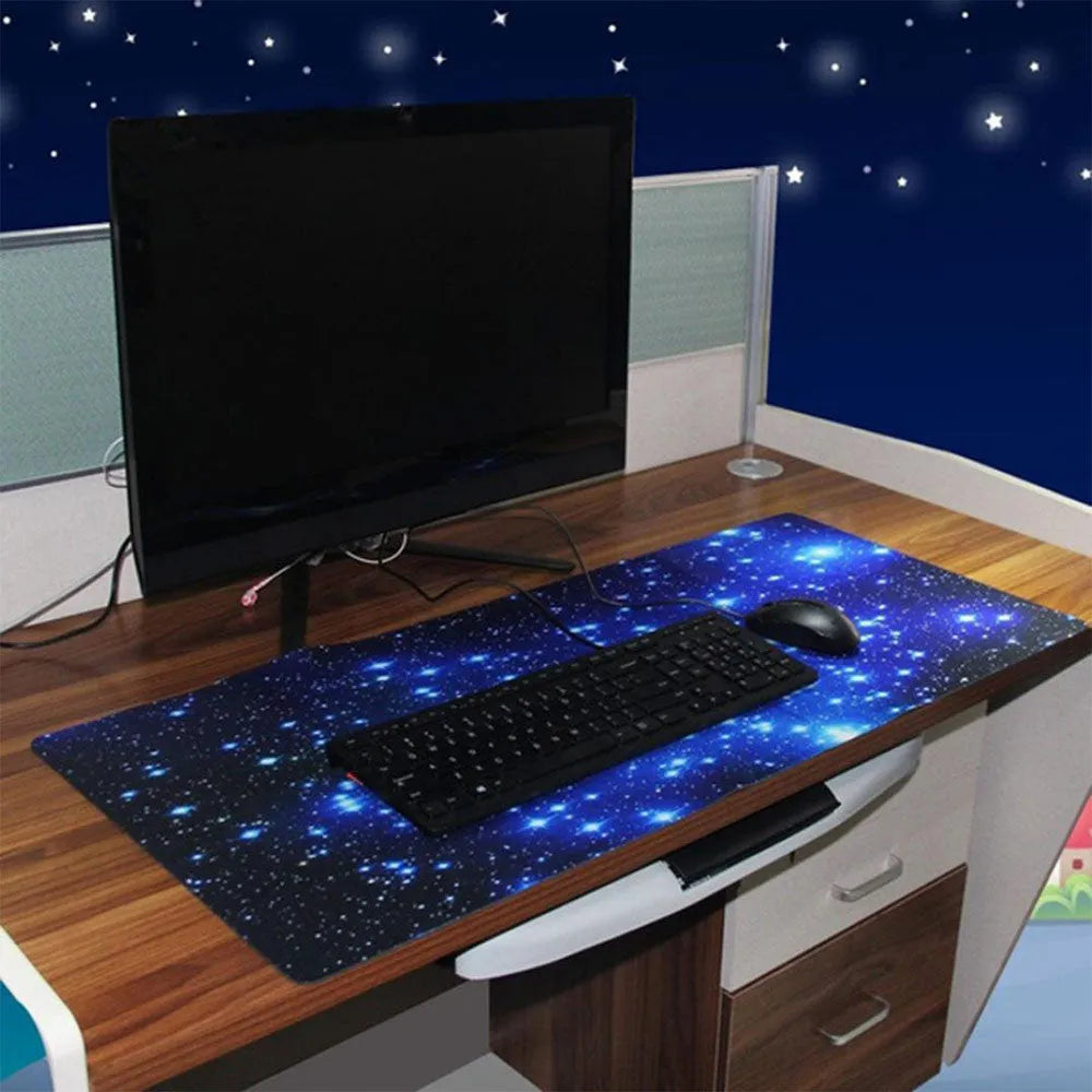 Blue star mouse pad with high-density fabric surface and anti-skid rubber base on a desk