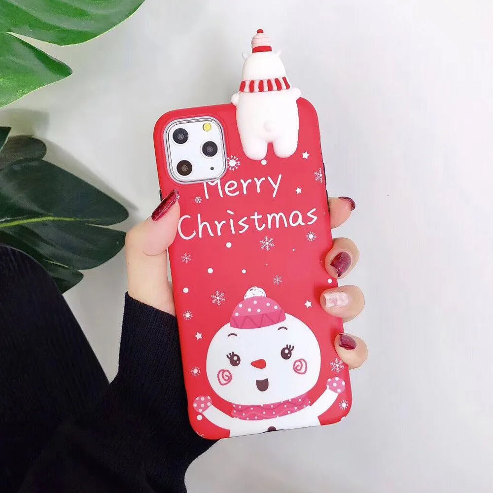 Christmas themed silicone back cover case for Apple iPhone on a festive background.