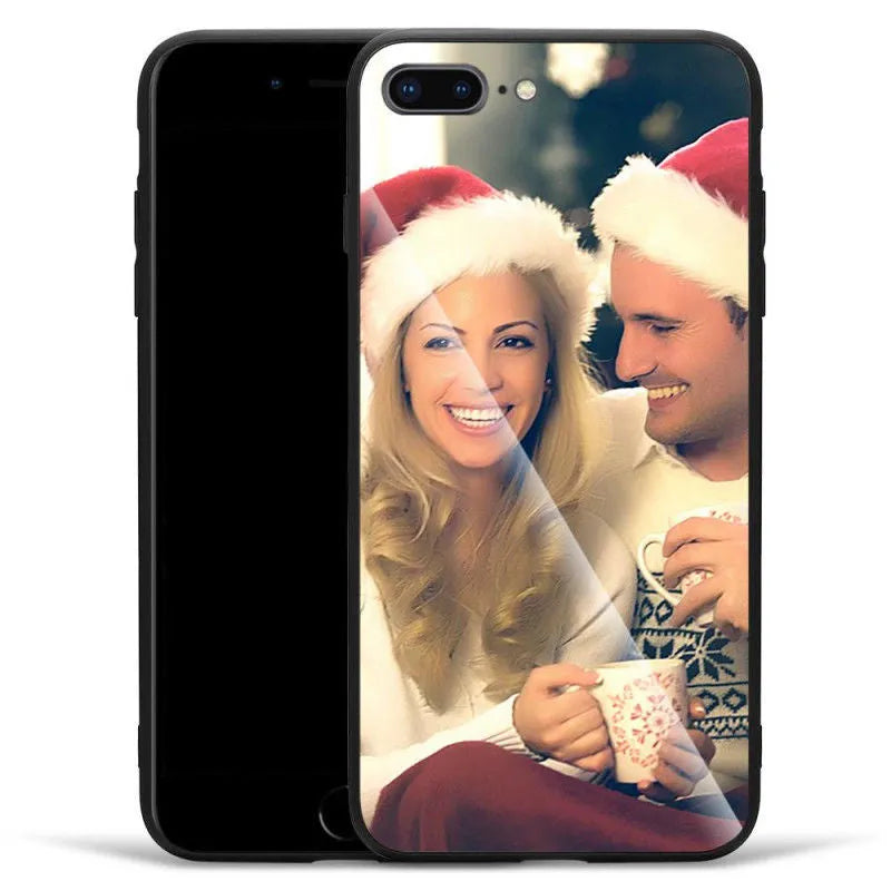 Slim patterned protective case for Apple iPhone with raised edges around screen and camera.