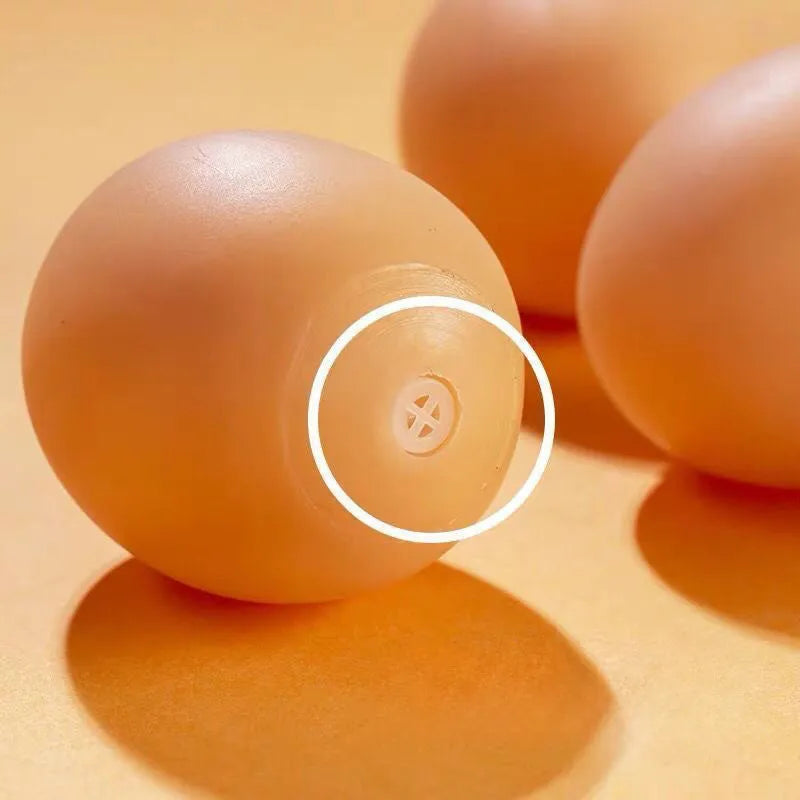 Realistic egg-shaped dog chew toy with textured surface and sound-emitting features for interactive pet play