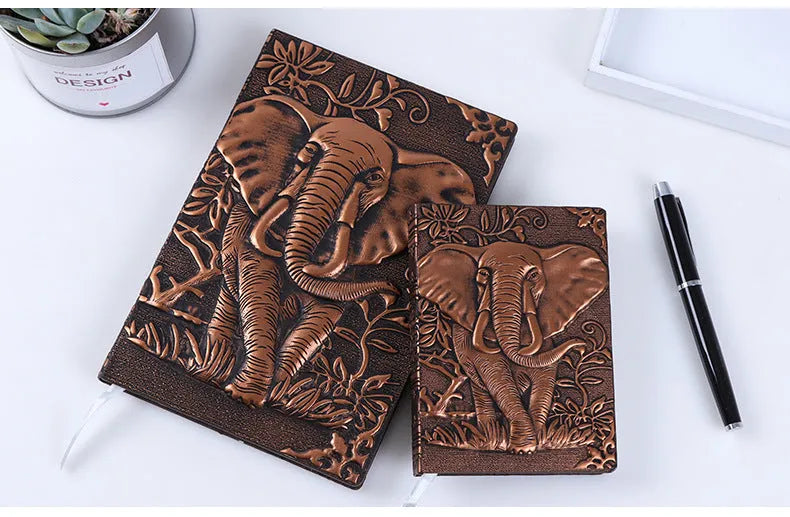 Hardcover PU leather notebook with embossed retro cover and brushed bronze details, open at 180 degrees showing beige pages