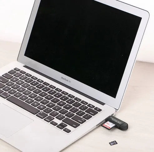 Black three-in-one card reader with Micro USB and USB 2.0 plugs, SD and Micro SD slots, 9g ABS body