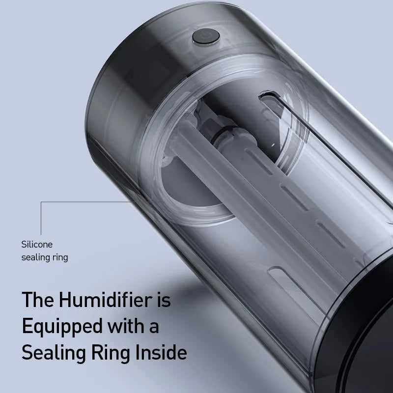 Black aluminium alloy car humidifier and air purifier with USB cable on a car dashboard