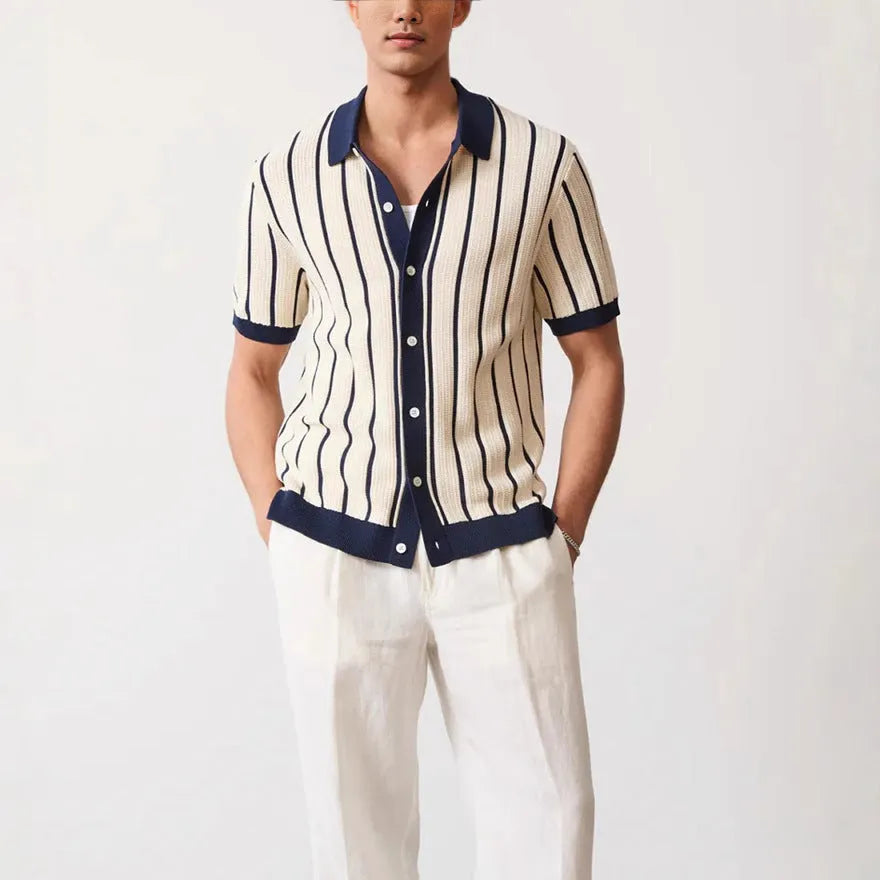 Men's white asymmetric short sleeve knit top with a lapel neckline on a mannequin.