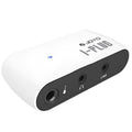 White multi-effects metal distortion headphone amplifier with battery compartment and connectors