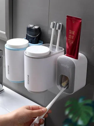 Wall mounted automatic toothpaste dispenser and toothbrush holder set with suction cup mounting