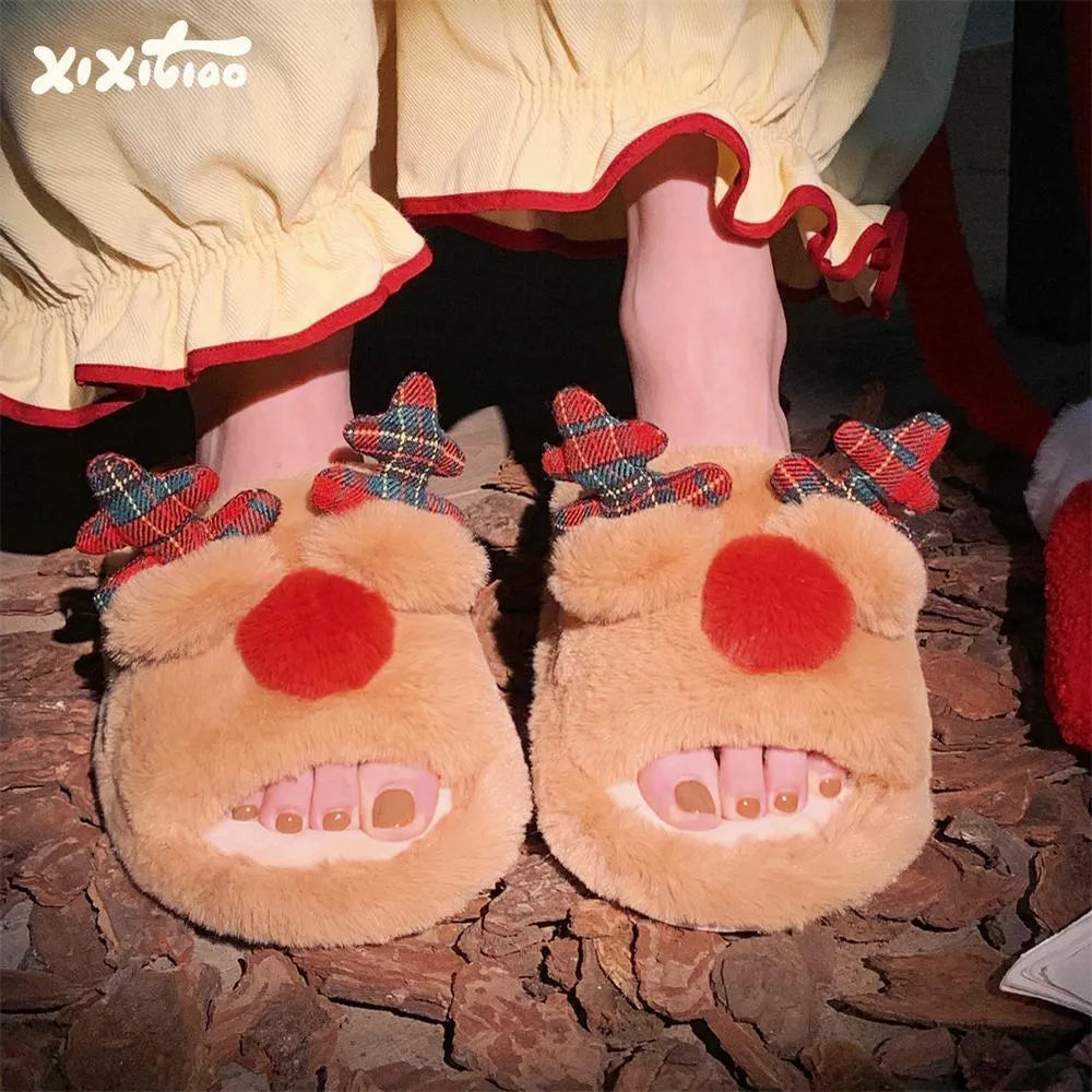 Brown women's slippers with a cartoon deer design, suede upper, and PVC sole.