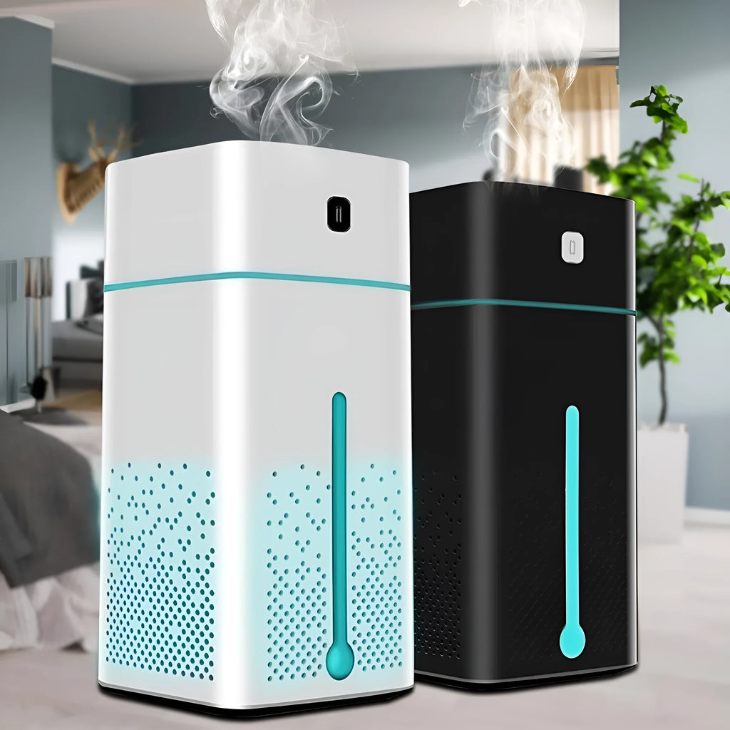 Black and white compact desktop humidifier with USB cable and 1000ml water tank.
