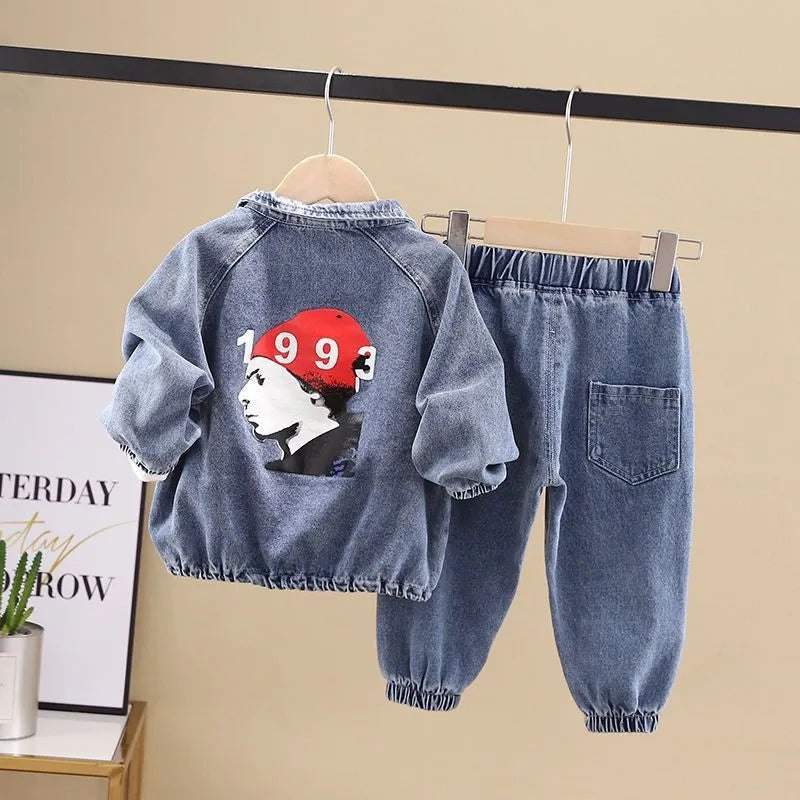 Boys wearing a black or blue denim two-piece suit set with long sleeves, Korean style.