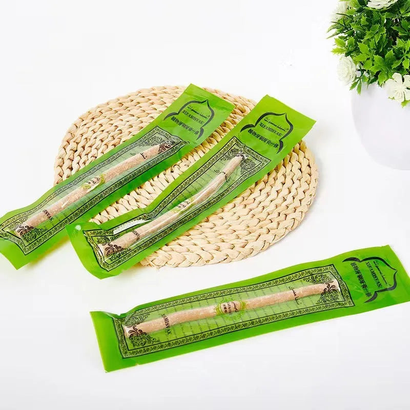 Wooden teeth cleaning stick on bathroom counter for adult oral hygiene