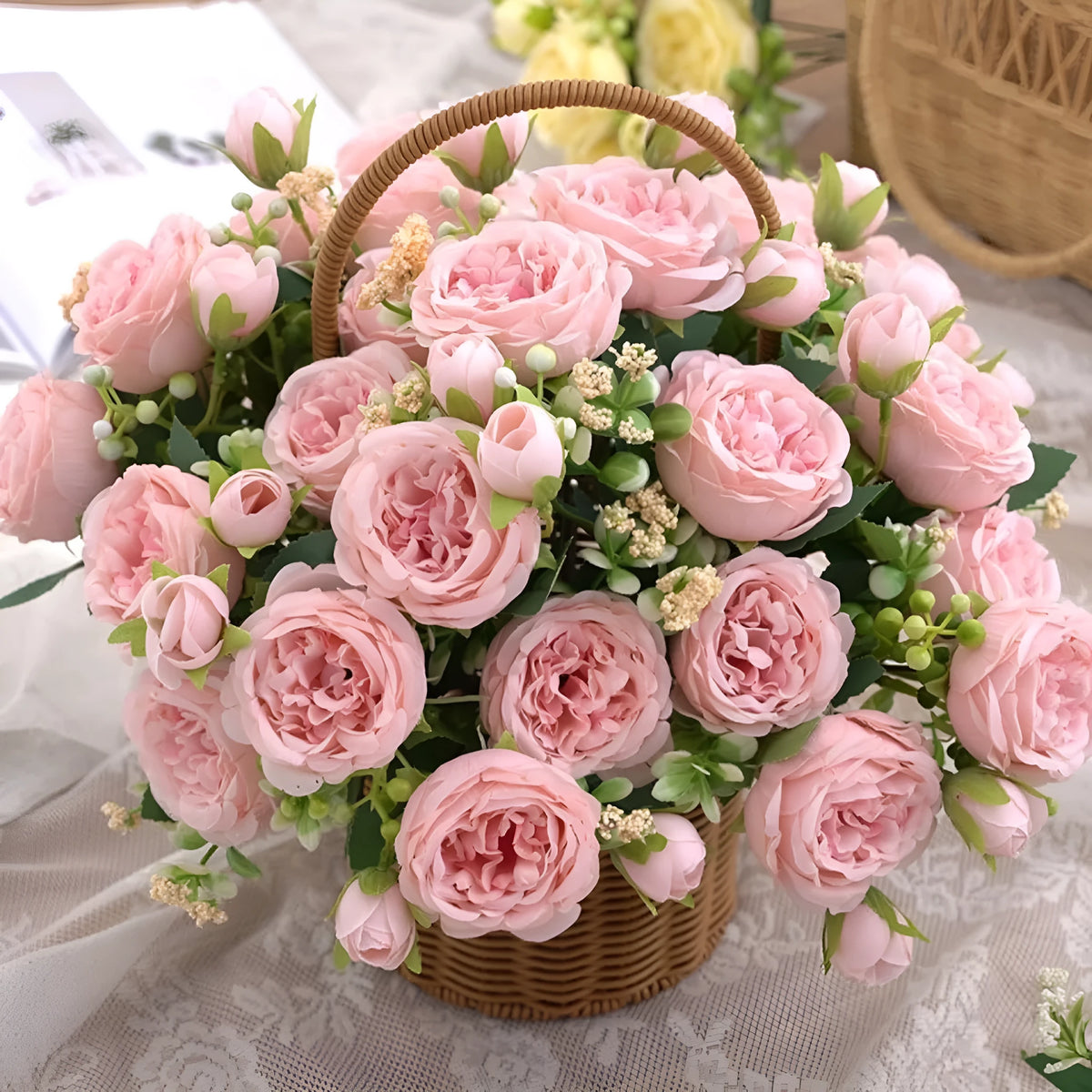 Artificial rose bouquet in pink beige champagne and light blue for wedding decoration, made from plastic and silk flower.