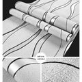 Close-up detail of dark brown 3D curve stripe wallpaper with thick deerskin velvet texture on a non-woven base.