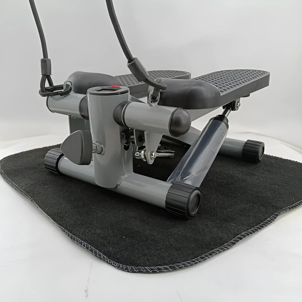 Silver grey hydraulic resistance exercise stepper machine for home fitness.