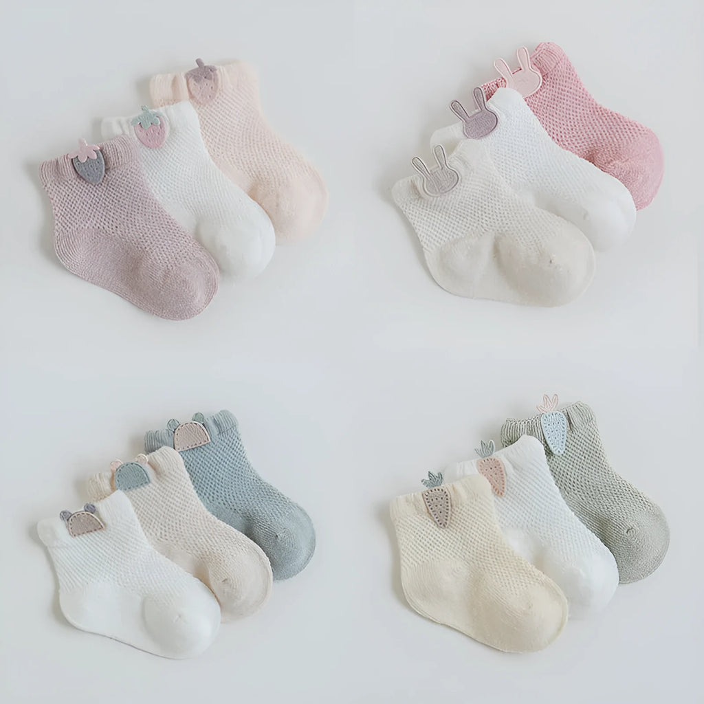 Baby mesh socks in pastel colours, cotton blend, XS to L sizes for 0-5 years, on a white background