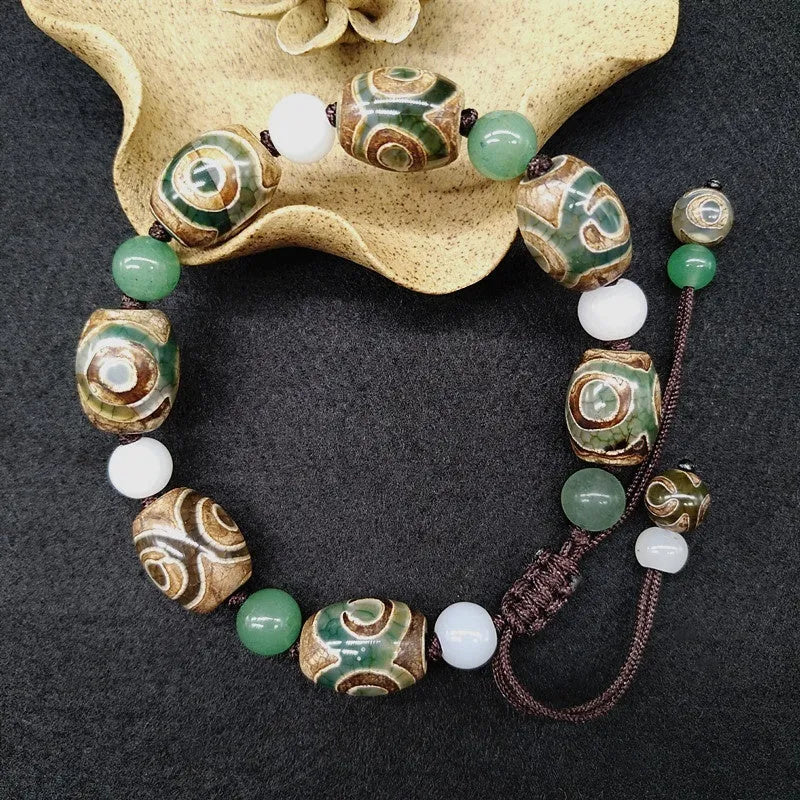 Green agate ethnic bracelet with hand-woven Tibetan beads on black stretch cord