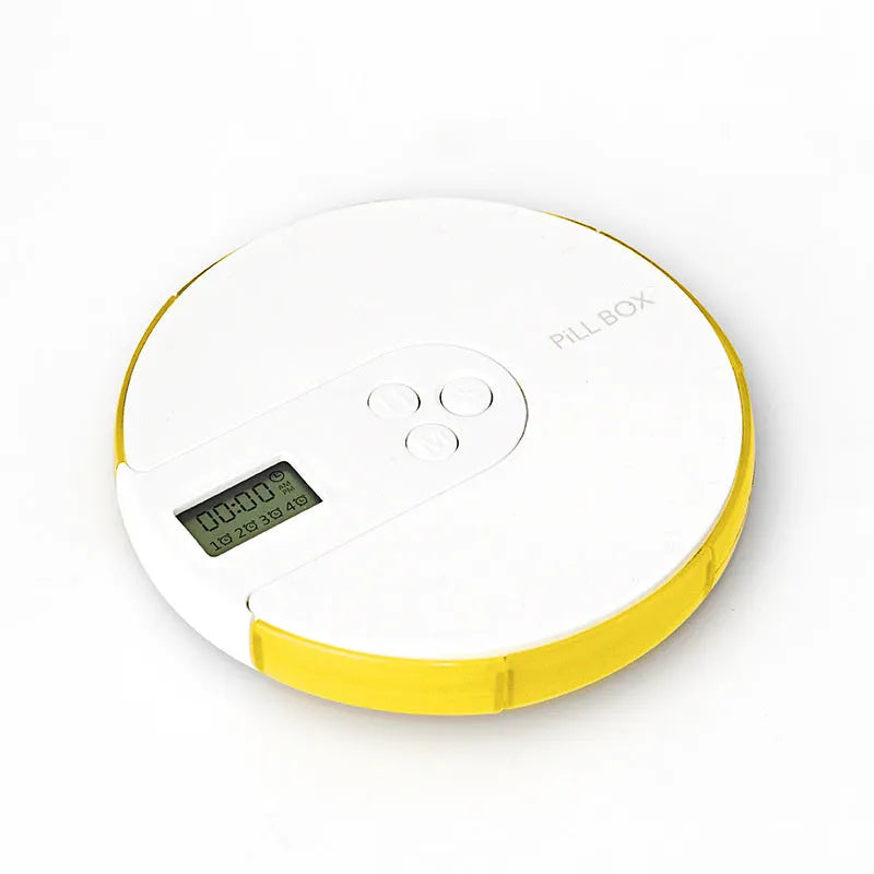 Blue seven-day alarm clock pill dispenser with digital display, showing daily compartments and measuring 11cm wide.