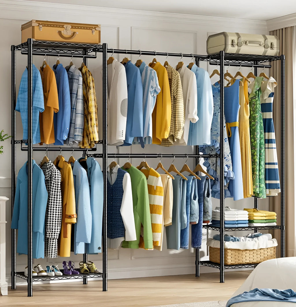 Black metal floor-standing storage rack for clothing organisation.