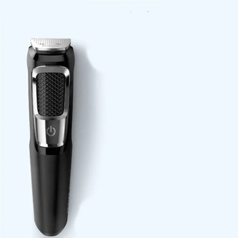 Multifunctional nose and beard hair trimmer with cleaning brush on a white background.