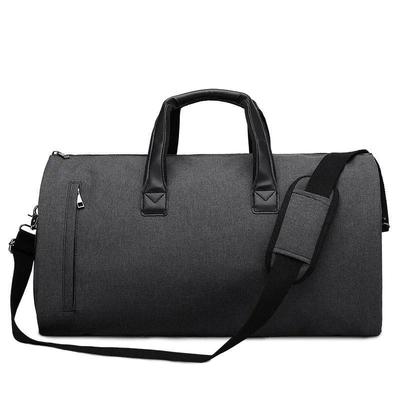Medium light grey Oxford cloth travel bag open to show internal wet/dry separation compartments and camera insert pocket.